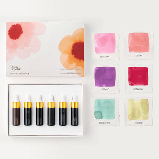 Set of mini ink collection with color swatches on a white background